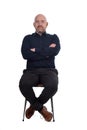 Bald man sitting on white background Royalty Free Stock Photo