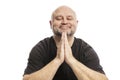 Bald middle aged man laughs, prayer, isolated on white background