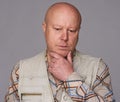 Bald sad senior man isolated Royalty Free Stock Photo