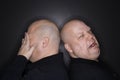 Bald twin men crying. Royalty Free Stock Photo