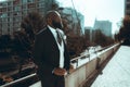 A Bald Black Man in Sharp Suit and Beard Royalty Free Stock Photo