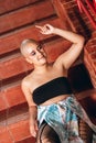 Bald woman breaking beauty standards. Self-confident woman and her beauty.