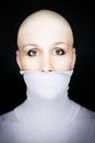 Bald woman turtleneck