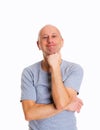 Baldheaded man in front of white background