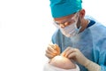 Baldness treatment. Hair transplant. Surgeons in the operating room carry out hair transplant surgery. Surgical