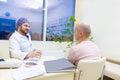 Baldness treatment. Patient suffering from hair loss in consultation with a doctor. Preparation for hair transplant Royalty Free Stock Photo