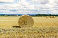 bale of straw on fields with blue sky Royalty Free Stock Photo