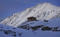 Balea Lake Chalet on sunset in the Fagaras Mountains Royalty Free Stock Photo