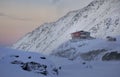 Balea Lake Chalet on sunset in the Fagaras Mountains Royalty Free Stock Photo