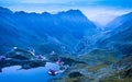 Balea lake and Transfagarasan road in Fagaras mountain. Romania Royalty Free Stock Photo