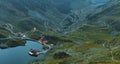 Balea lake and Transfagarasan road in Fagaras Royalty Free Stock Photo