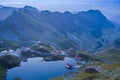 Balea lake and Transfagarasan road Romania at sunset Royalty Free Stock Photo