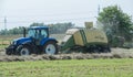 Baler at the haymaking Royalty Free Stock Photo