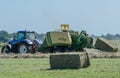 Baler at the haymaking Royalty Free Stock Photo