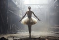 Balerina dancing in an empty industrial building.