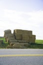 Bales of Hay on farm field after harvest Royalty Free Stock Photo