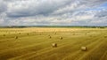 Bales of hay in the field. A stack of hay. Straw in the meadow Royalty Free Stock Photo