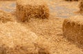 Bales of hay with loose hay scattered Royalty Free Stock Photo