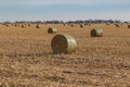 Bales of hay. Post harvest corn field. Storage facility. Irrigation system. broken corn stalks. farmland. farm in Nebraska Royalty Free Stock Photo
