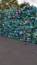 Bales of squashed green plastic bottles for recycling Royalty Free Stock Photo