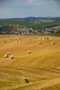 Bales of straw on a harvested field, Tuscany, Italy, Europe