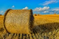 Bales of Straw On A Harvested Grainfield Royalty Free Stock Photo