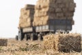 Bales straw in a tractor trailer Royalty Free Stock Photo