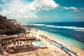 Bali beach Melasti landscape on Bukit with cliff view on turquoise transparent sea beach local cafe restaurant with swimming pool