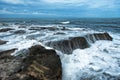 Waves Crashing Over Rocks on the Bali Coastline Royalty Free Stock Photo