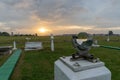 BALI/INDONESIA-APRIL 05 2019: Campbell-stoke at Ngurah Rai Meteorology Station with green grass and orange sunset under the cloudy Royalty Free Stock Photo