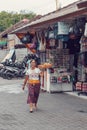 Woman is offering sacrifice, Bali Indonesia Royalty Free Stock Photo