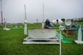 BALI/INDONESIA-DECEMBER 21 2017: A meteorological observer checks the water thermometer to make sure the evaporation rate on that