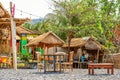 Typical small cafe on Black Sand Beach on Bali Royalty Free Stock Photo