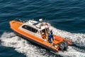 Closeup of Pilot boat and crew outside Benoa Harbor in Bali, Indonesia