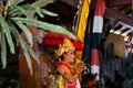 Bali - Indonesia - 10.22.2015: A female balinese stage actress performing in colorful traditional clothes