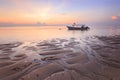 Fishing boats populate the shoreline at the Sanur Beach Indonesia