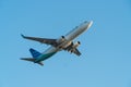 BALI/INDONESIA-JUNE 06 2019: Garuda Indonesia, one of the airlines in Indonesia which join the sky team, is flying over the blue