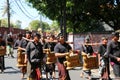 Local balinese people playing traditional music instrument on ceremony.