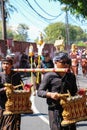 Local balinese people playing traditional music instrument on ceremony.