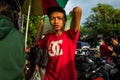 Bali, Indonesia - March 22, 2018: A young Indonesian man working on market in Ubud