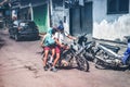 BALI, INDONESIA - MAY 23, 2018: Group of balinese schoolboys in a school uniform on the street in the village. Royalty Free Stock Photo