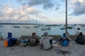 BALI/INDONESIA-MAY 15 2019: On a sunny and slightly cloudy day, some people are spending their weekend with fishing. They are