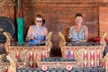 BALI, INDONESIA - MAY 5, 2017: Women playing on Traditional Balinese music instrument gamelan. Bali island, Indonesia. Royalty Free Stock Photo