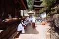 Bali, Indonesia-Nov 08, 2012: Balinese pray inside the temple in Bali