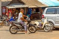 Local balinese man on a scooter.