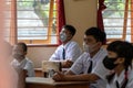 BALI,INDONESIA-5 OCT 2021: classroom atmosphere in Indonesian junior high schools when learning the new normal. Students are seen