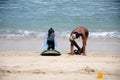 People learning surfing on the Balinese beach