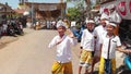 BALI, INDONESIA - OCTOBER 9, 2018: 4K aerial flying video of Balinese children in traditional costumes.