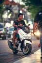 BALI, INDONESIA - OCTOBER 12, 2017: Scooters on the Legian street, Kuta, Bali, Indonesia. Motorbike traffic.