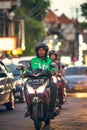 BALI, INDONESIA - OCTOBER 12, 2017: Scooters on the Legian street, Kuta, Bali, Indonesia. Motorbike traffic.